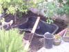 Rigid pond liner in place.